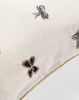 Embroidered bow pillow, cream cotton velvet