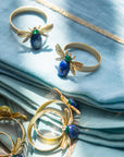 Etched wing bug skinny napkin rings, lapis lazuli, set of four