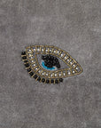 Embroidered evil eye pillow, grey cotton velvet