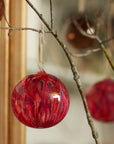 Feather paint large glass balls, red, set of two