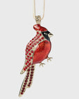 Red bird-shaped pendant with gold accents on a white background