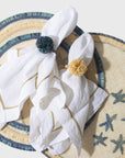 Ruffle edge straw placemat, indigo, set of four