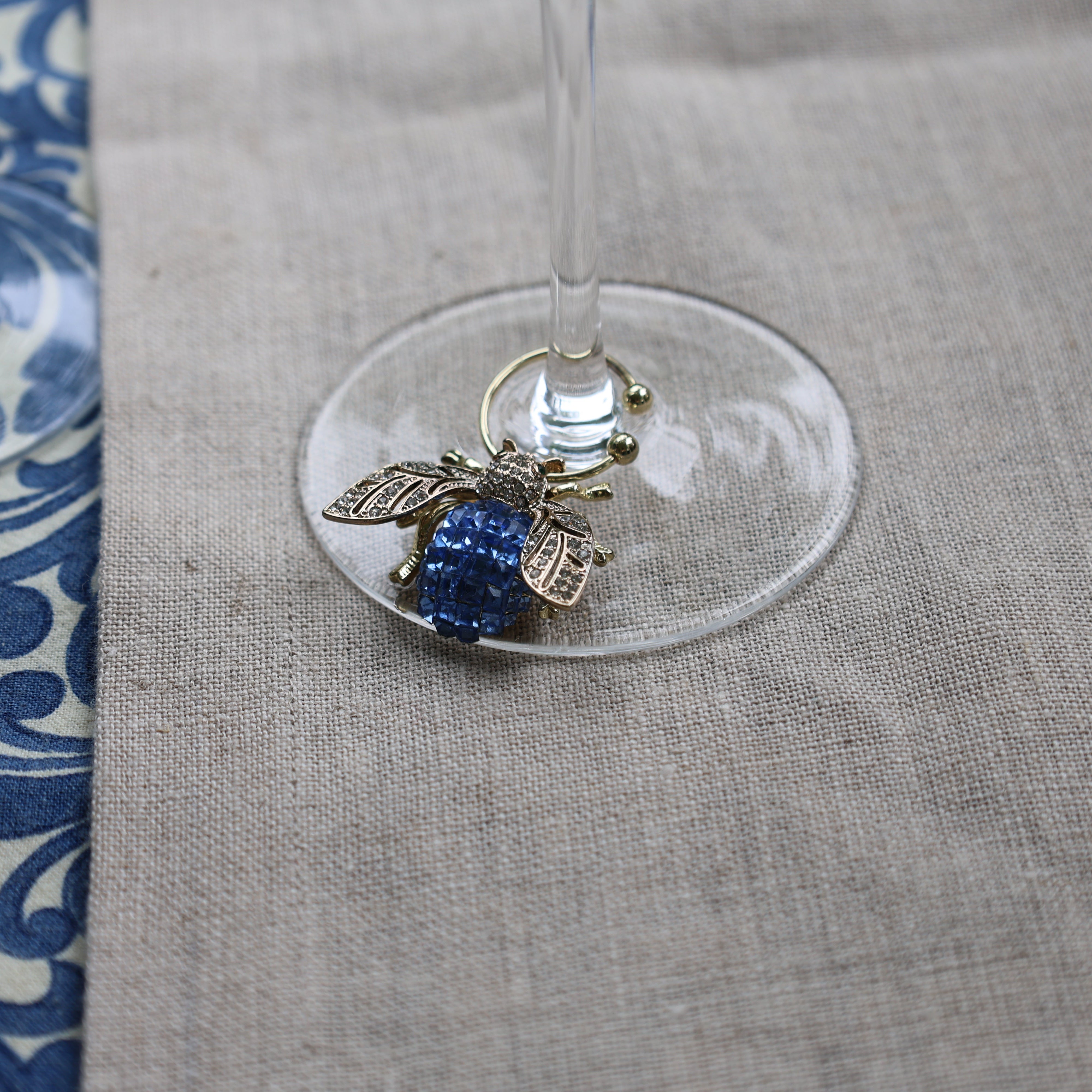 Bedazzled bee wine charms, dark jewel tones