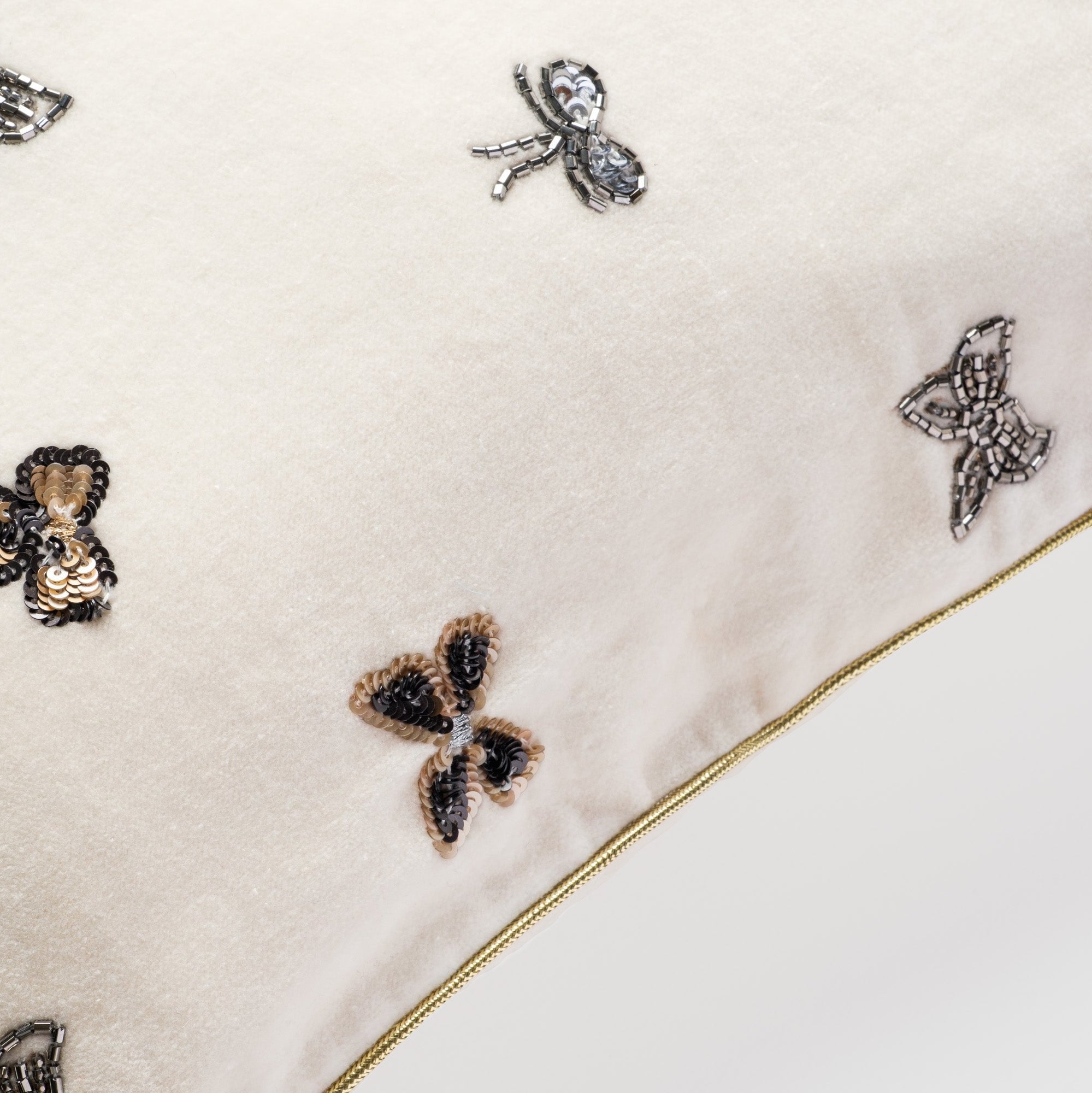 Embroidered bow pillow, cream cotton velvet