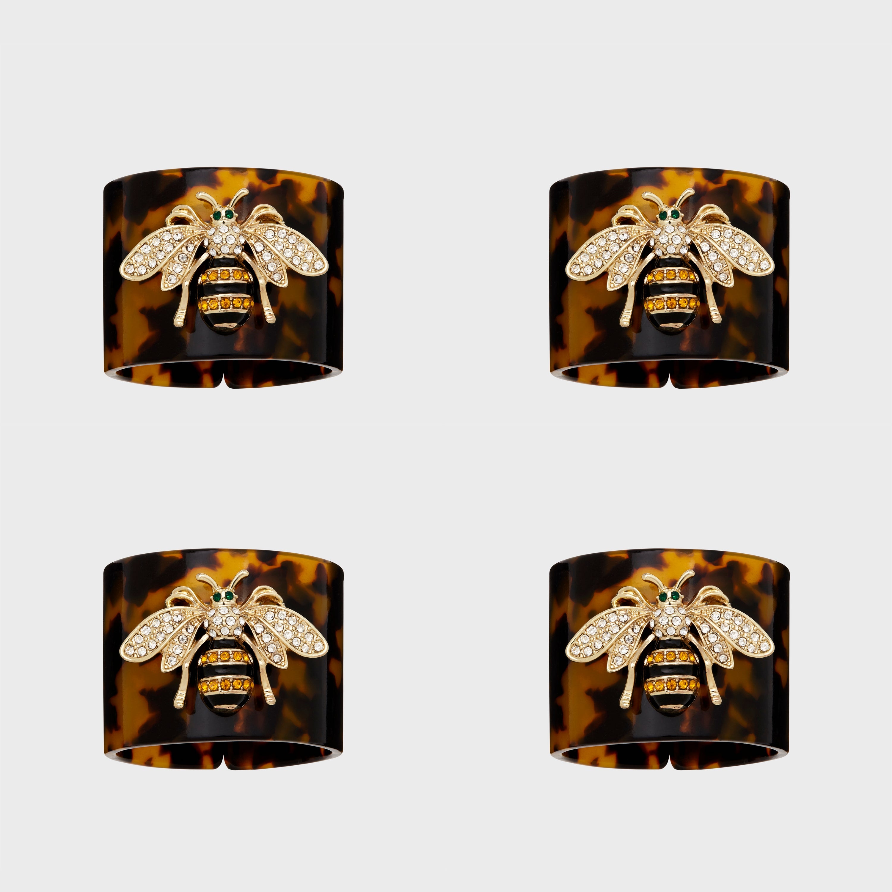 Stripey bee resin napkin rings, tortoiseshell, set of four