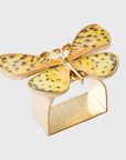 A gold-colored napkin ring featuring a yellow butterfly with black spots on its wings.