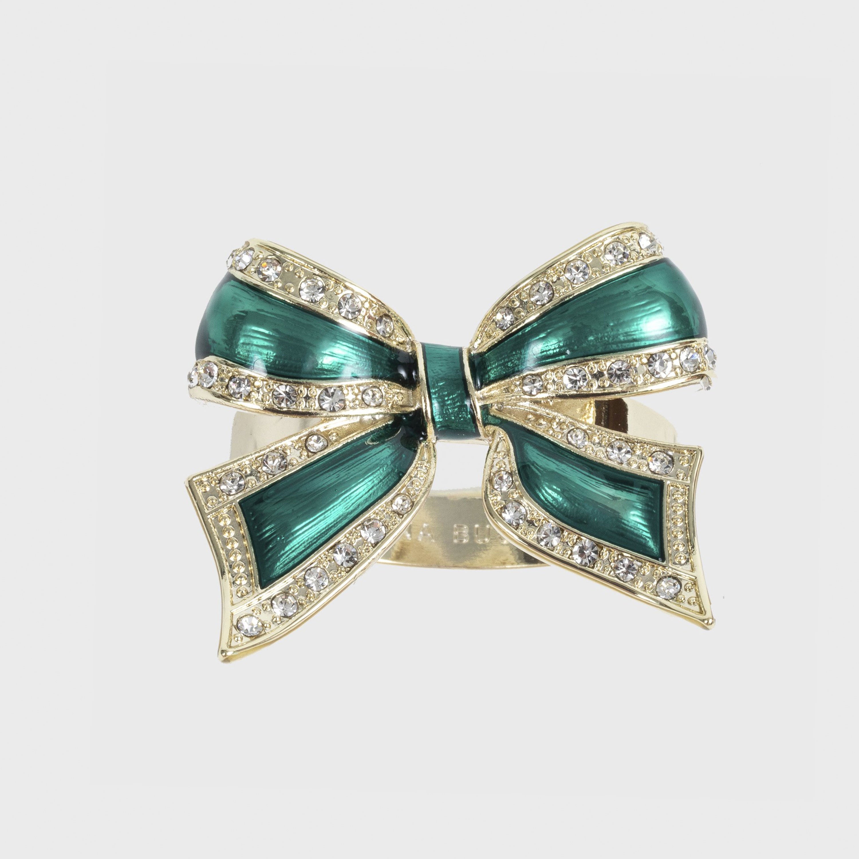 A green and gold enamel bow napkin ring with rhinestone accents.