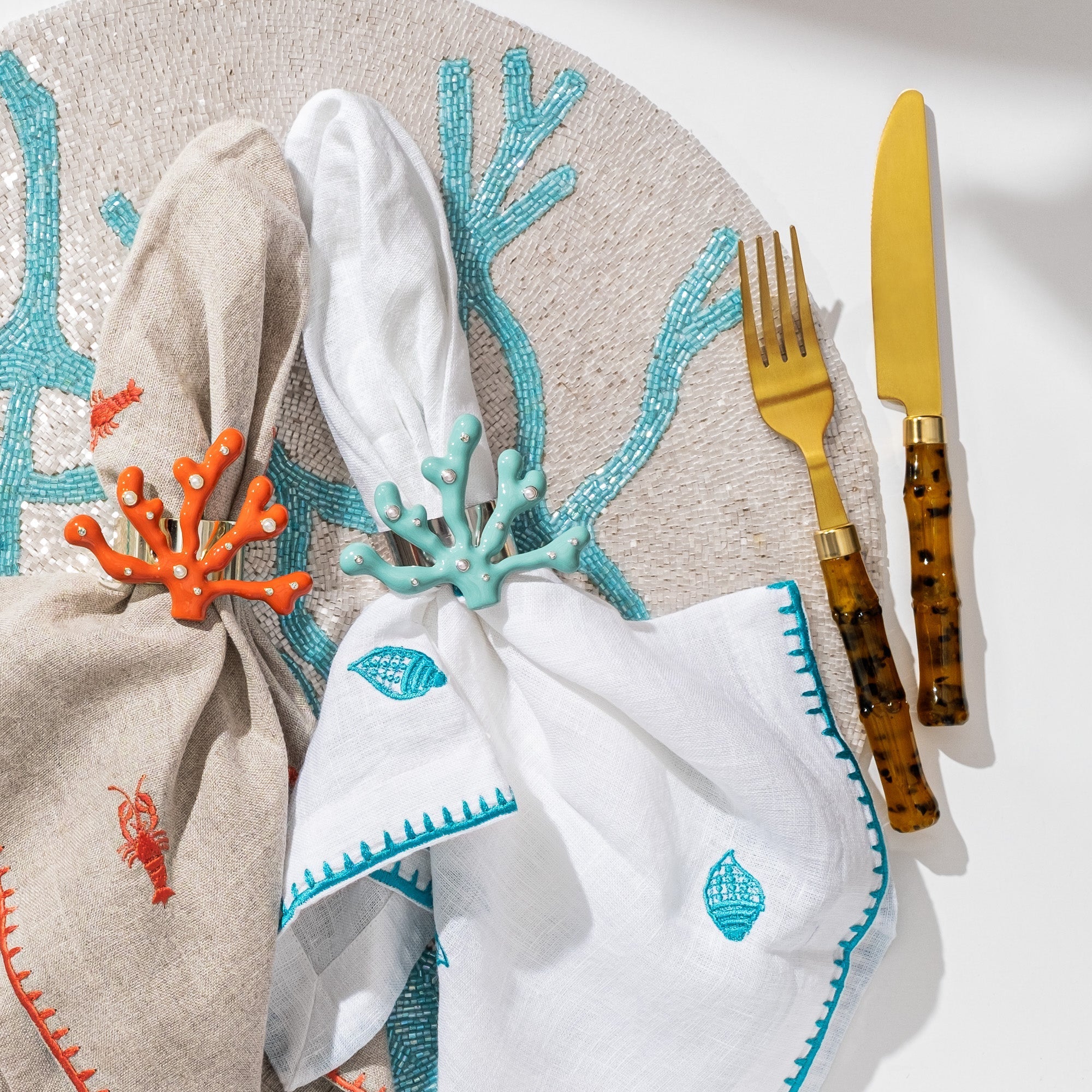 Delicate coral hand beaded placemat, turquoise