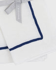 Navy trim linen dinner napkins, white, set of two