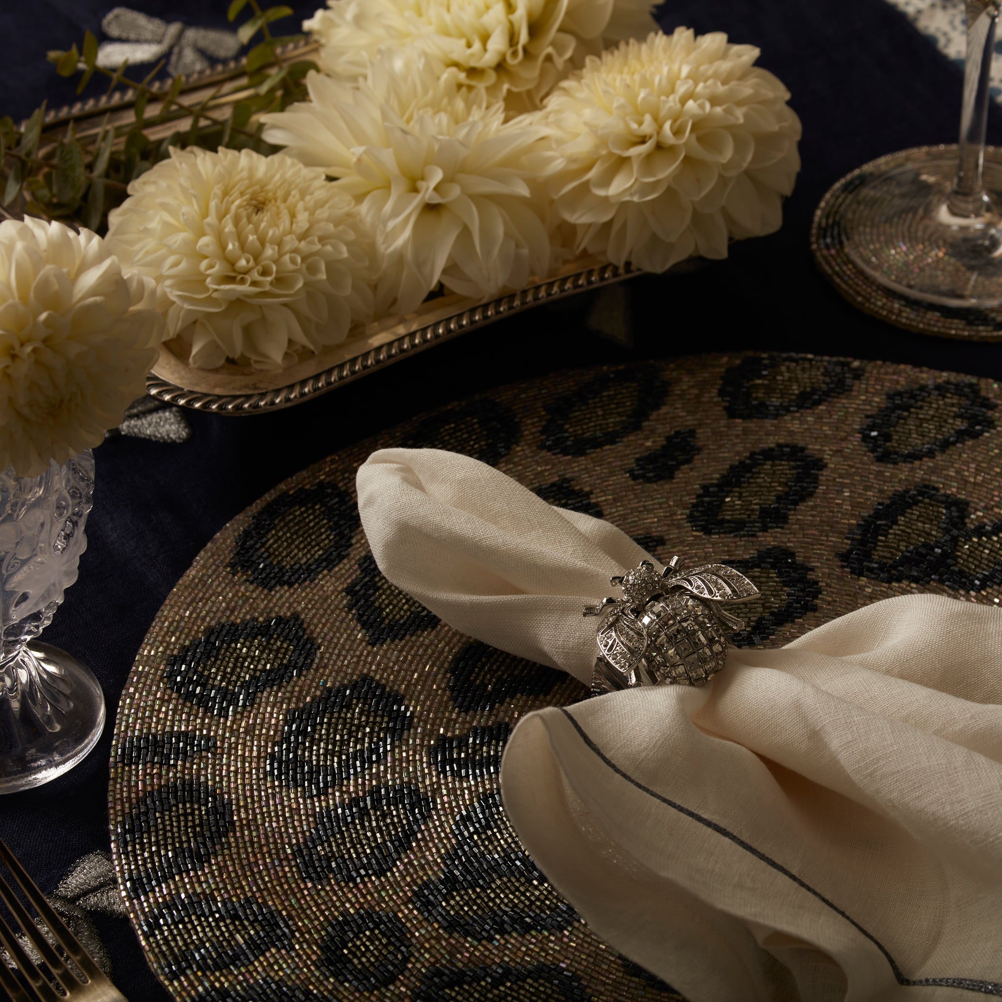 Animal pattern hand beaded placemat, silver