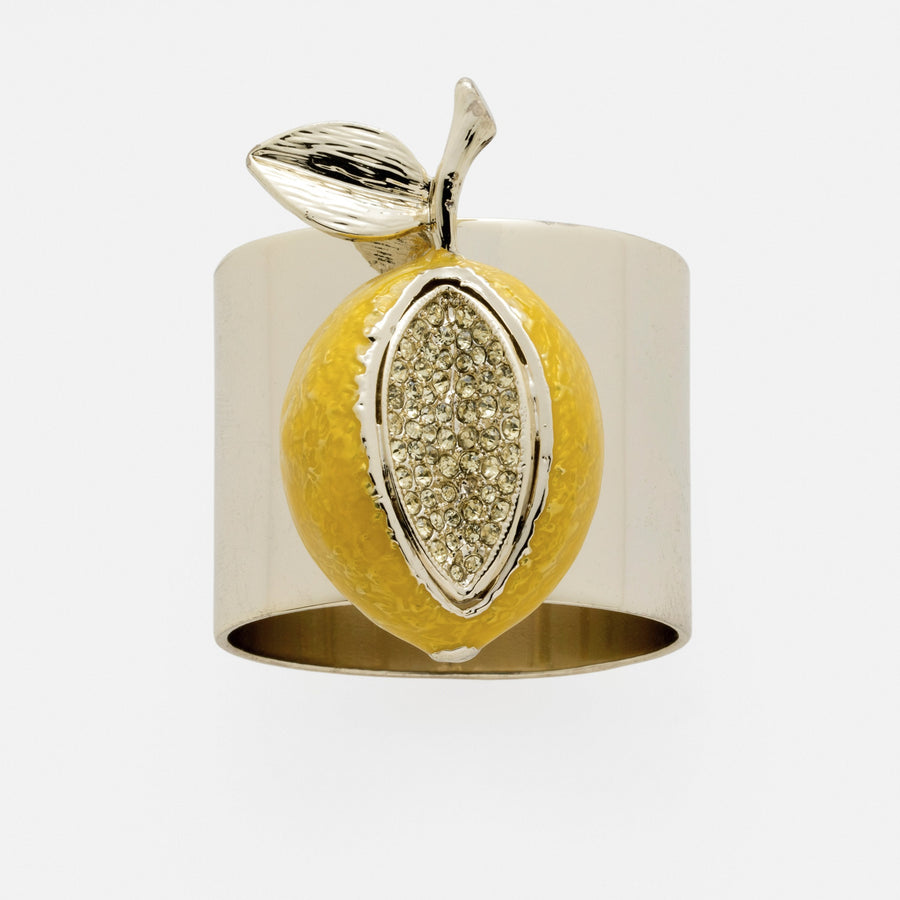 A gold-colored napkin ring designed to resemble a lemon with a yellow rind 