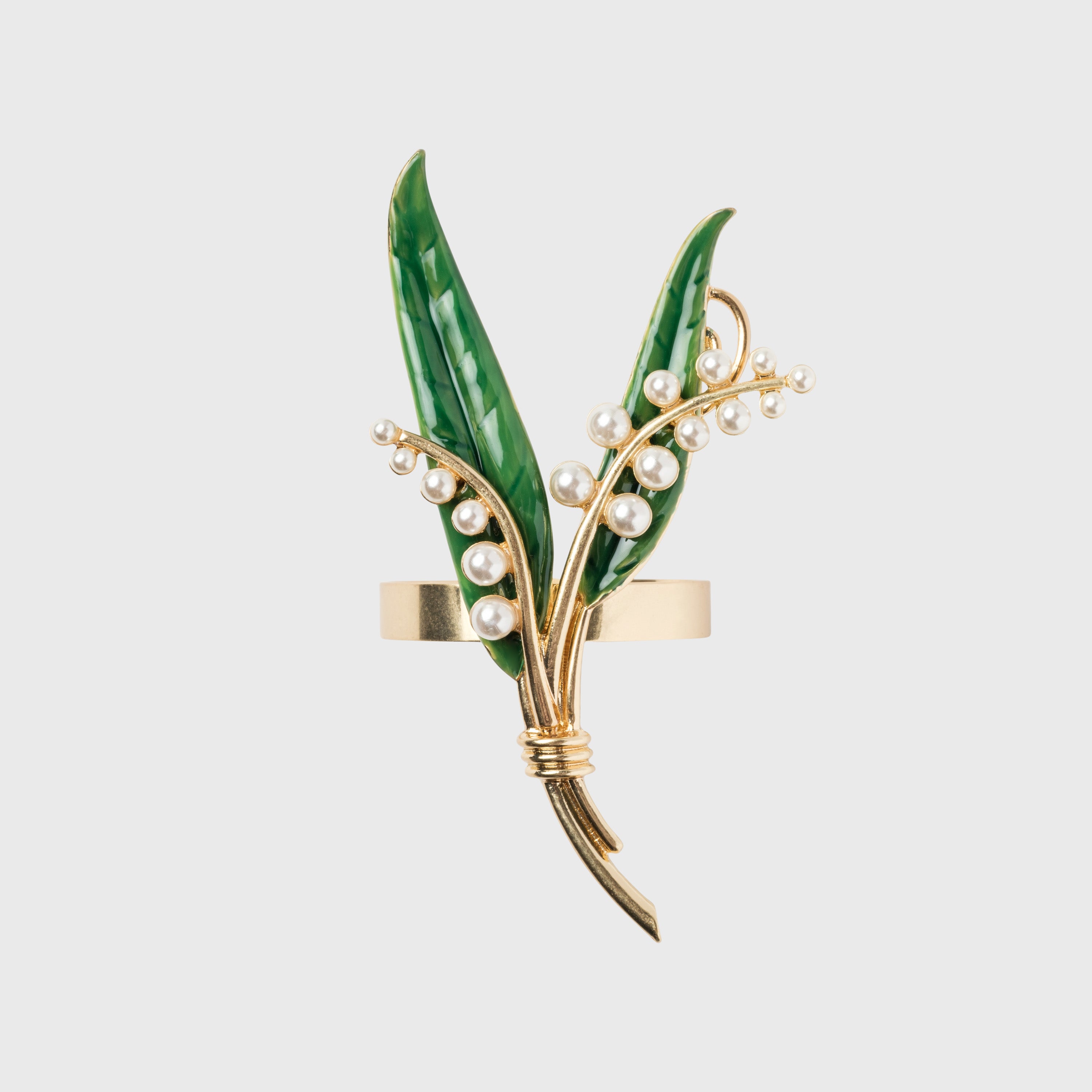 Gold napkin ring with green leaves and pearl-like beads 
