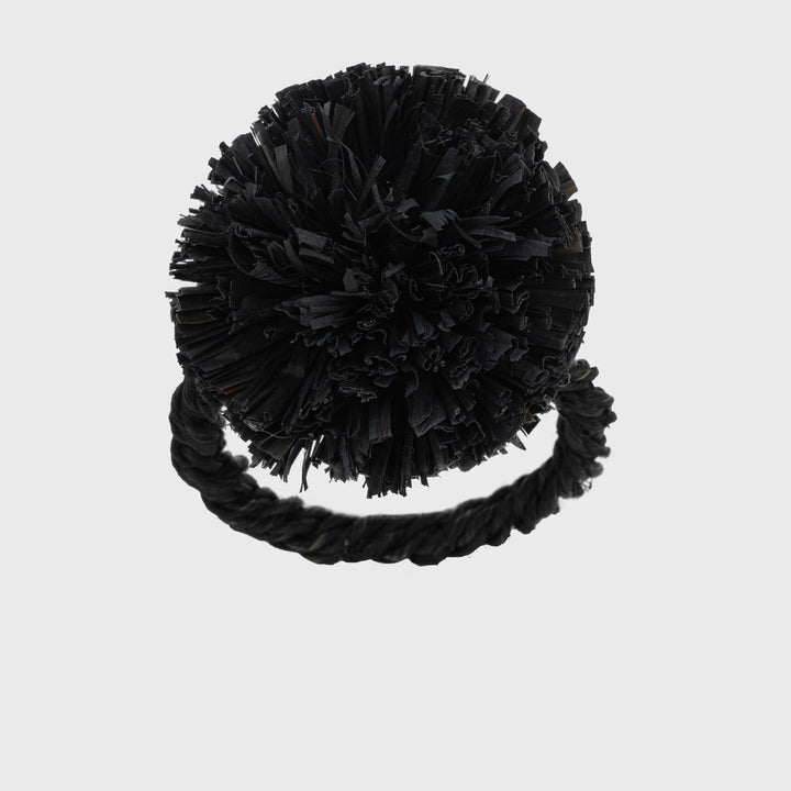 Black straw pompom napkin ring 