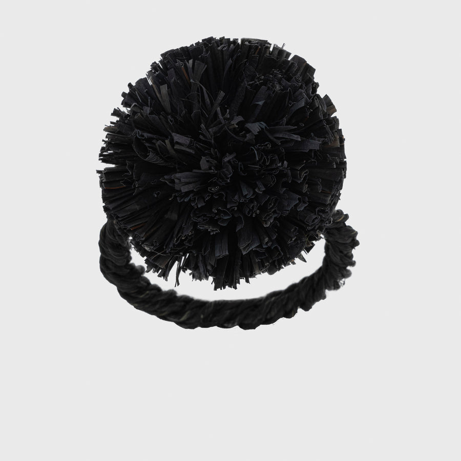 Black straw pompom napkin ring 