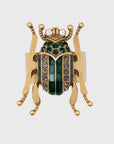 Enamel beetle napkin rings, worn gold, set of four