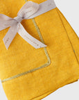 Gold trim dinner napkins, yellow, set of two